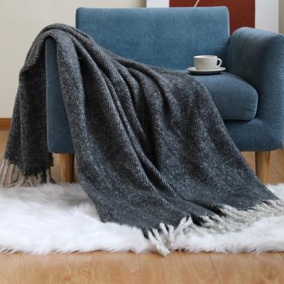 China Hot Sale Large Jacquard Wave Woven Folded Knitted Acrylic Throw Blanket With Tassel for sale