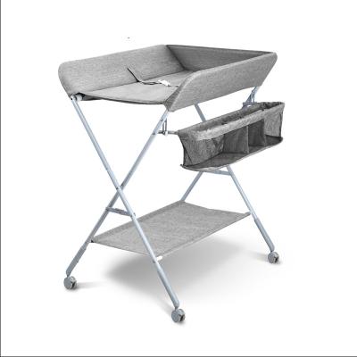 China Portable Folding Changing Table Wirh Rising And Falling Changing Baby Rack for sale