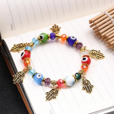 China FASHIONABLE Crystal Stone Bracelets Unisex Lava Healing Fashion Palm Eye Gem Stone Beaded Bracelets Charms for sale