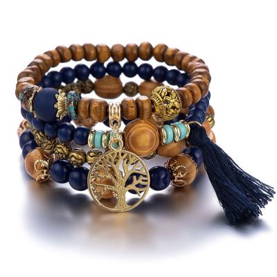 China Trendy Punk Ethnic Tree of Life Wooden Beads Bracelets For Man Bohemian Layered Bracelets Elastic Jewelry for sale