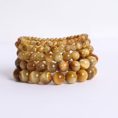 China CLASSIC Manufacturers Wholesale Natural Gold Stem Eye Beads Bracelet Healing Stone For Women Men for sale