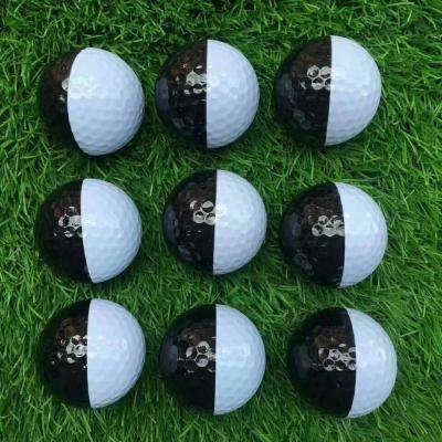 China Rubber + Surlyn Two Black And White Color Golf Ball Custom 2 Piece Putting Practice Half Colored for sale