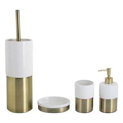 China Sustainable 4pcs Ceramic Bathroom Accessories Set Stoneware And Bronze Metal Bath Soap Dish Tumbler Pump Lotion Countertop Brush for sale