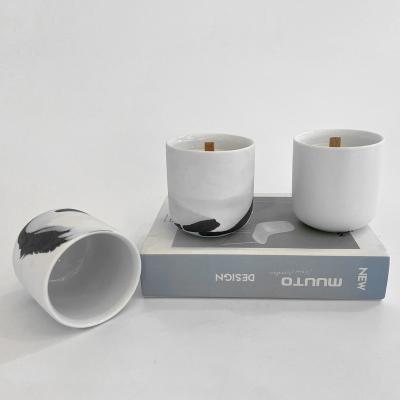 China Cheap home decorative matte cylinder porcelain table decoration ceramic empty candle jars container home for candle making for sale