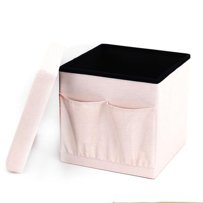 China RTS Pink Foldable Cloth Folding Stool Storage Stool With Pocket For Living Room Optional Color for sale