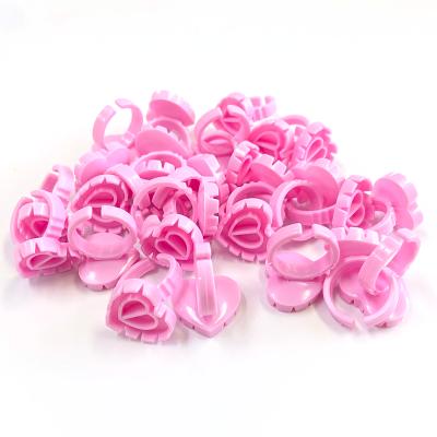 China 100 PCS Natural Disposable Plastic Heart-Shaped Eyelash Glue Eyelash Glue Holder Palette Dye Ring Cup Eyelashes Extension Tattoo Glue Makeup Tool for sale