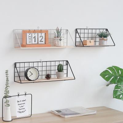 China Modern Simple Wire Living Room Shelf Wall Rack Iron Wood Hanging Organizer Rack Hanging Shelf Decorative Rack for sale