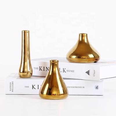 China Nordic Decor Art Ins Ornaments Creative Gold Ceramic Vase Flower Home Living Room Decoration Flower Insert Ornament for sale