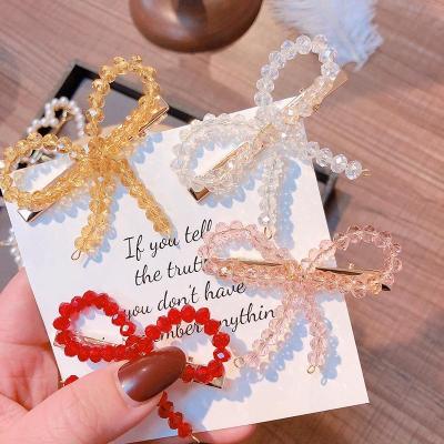 China Eco-friendly Advance and Nickel Plating Fashion Free Bow Anti-allergy Accessory Acrylic Decoration Crystal Korean Hair Clip for sale