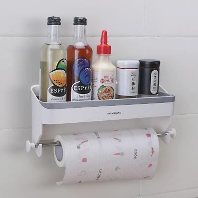 China Sustainable Plastic Kitchen Wall Mount Self Adhesive Shuangqing Film Roll Rack With Sauce Bottle Storage Rack No Drilling for sale