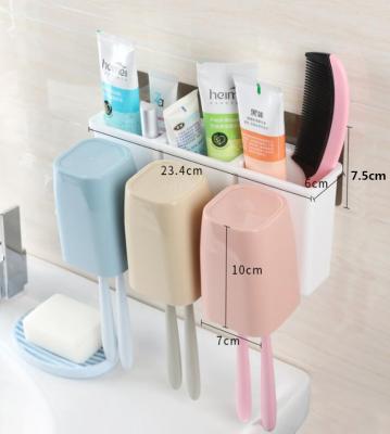 China Modern Family Viable Hot Selling Plastic Bathroom Accessories Toothbrush Toothpaste Holder Set With Storage Rack for sale