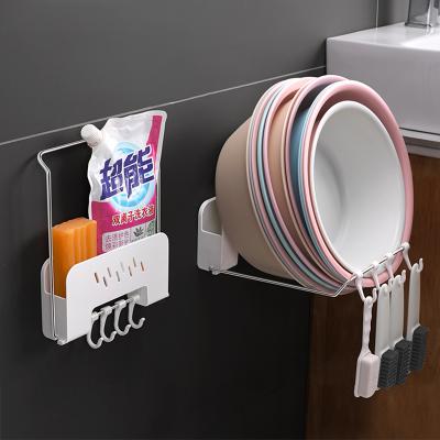 China Sustainable Multifunctional Wall Mounted Bathroom Kitchen Stainless Steel Sink Rack With Hook Shampoo Holder for sale