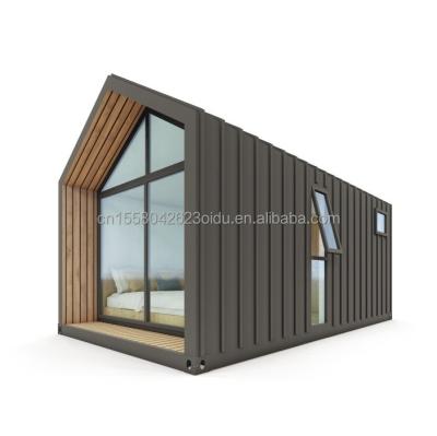 China Modern Triangular Resort Hotel Prefab Container House with One Bed Bathroom Kitchen and Garden Features Sandwich Panel Door for sale