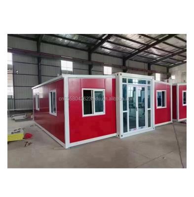 China Modern Design 40ft Folding Expandable Flat Prefabricated Container House with Good Prices and Aluminum Alloy Windows for sale