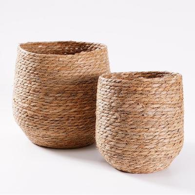 China New Design Sustainable Plant Plankton Material Straw Woven Storage Basket For Sundries for sale