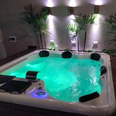 China Modern wholesale commercial endless outdoor plug and play 4-8 person spa swimming pool hot tub with led light for sale