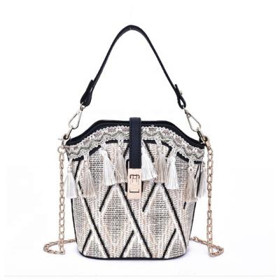 China Wholesale Lady NATIONAL Shell Straw Clutch Colorful Cylindrical Fashion Vintage Clip Handbags Around Rattan Beach Shoulder Bag For Girls for sale