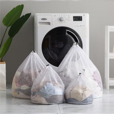 China Solid Color Large Capacity Household Drawstring Mesh Casual Eco-friendly Laundry Bag for sale