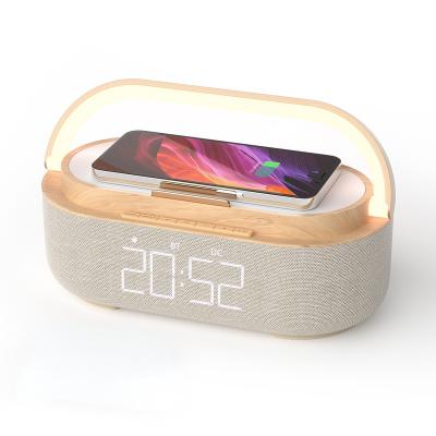 China Mobile Phone Trending Products 2022 New Arrivals 15W Multi Wireless Charger With Music Box And Time Clock for sale