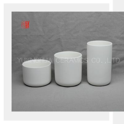 중국 Various Size White Ceramic Candle Jar With Inside Glaze Embossing Printing 판매용