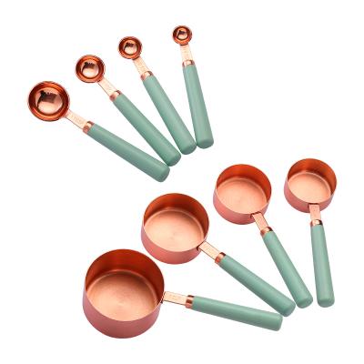 China Viable Measuring Cups and Spoons Set Wooden Handle Rose Gold Measuring Tools Stainless Steel Set of 8 Tablespoon Stackable Cup Teaspoon for sale