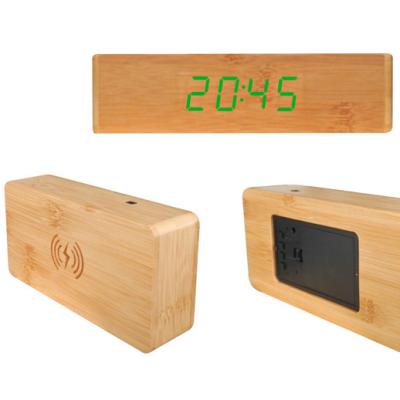 China Calendars Desk Alarm Clock Wooden Digital Wireless Charging Alarm Clock for sale