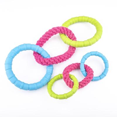 China Sustainable Puppy Teething Foamed TPR Toys With Durable Rope Dog Chewing Toys for sale