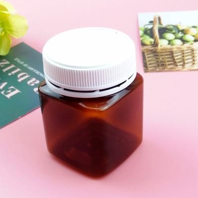 China Wide Mouth Sealing Cover Amber Honey 200ml Plastic Jar Food Grade for sale