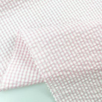 China Cotton Seersucker 140gsm 40s Stripe Cotton Yarn Breathable Soft Colored Breathable Woven Plain Dyed Fabric for sale