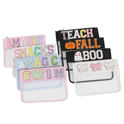 China Fashion Customized personalized letter cosmetic bag Multicolor travel durable transparent pouch Waterproof transparent Pvc cosmetic bag for sale