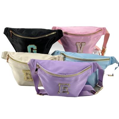 China Water proof New design 6 colors larger outdoor waterproof buckle cross chest waist bag nylon customizable logo Fanny women's bag for sale