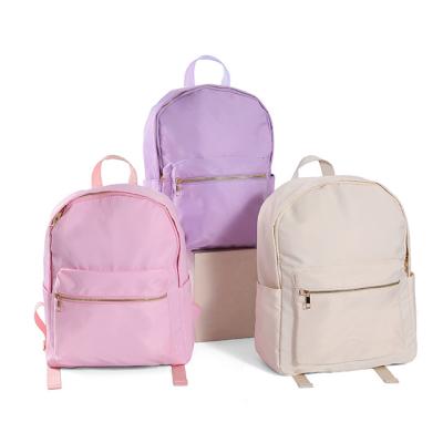 China Waterproof No MOQ nylon schoolbag in stock Children's large capacity backpack Waterproof travel backpack for sale