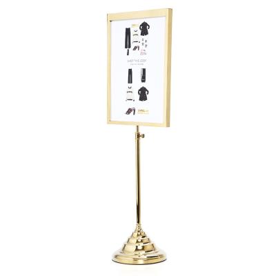 China Retail Store Mall Floor Stand Sign Holder Gold A4 Metal Poster Display Stand Etc. for sale