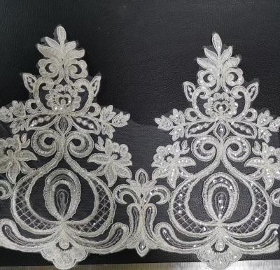 China New Sustainable Embroidery White Rope Bridal Lace Trim For Dress for sale