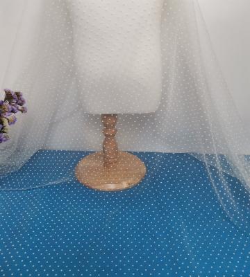 China Durable High Quality Dotted Mesh Soft White Flocking Tulle Fabric for sale