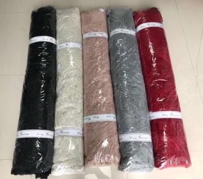 China Sustainable Factory Handmade Heavy Luxury African 3D French Tulle Flower Beaded Embroidery Lace Fabric for sale