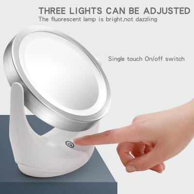 China OEM 3 AAA Lighted Batteries Powered 360 Degree Rotation Lighted LED Makeup Mirror With Magnifying Glass for sale