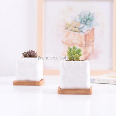 China Mini White Ceramic Planter Pot modern with creative saucer design 2 inch small modern ceramic flower pots for home garden for sale