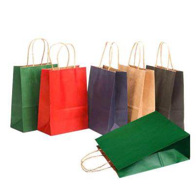 China Wholesale Price Biodegradable Brown Kraft Paper Bags Custom Printed Logo Shopping Paper Bags for sale