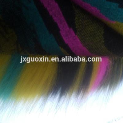 China Shrink-Resistant 100% Polyester 40mm Long Pile Plush Fabric 5 Color Jacquard Fuax Fur for sale