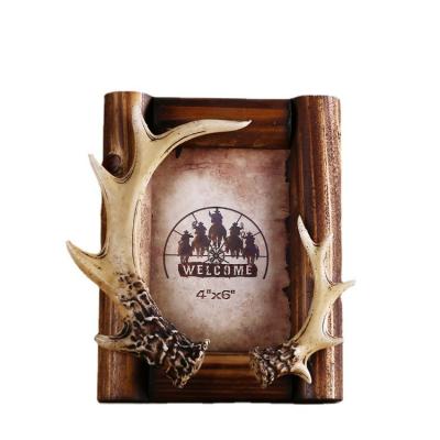 China Europe Style French Resin Craft Antlers Photo Frame For Wedding Party for sale