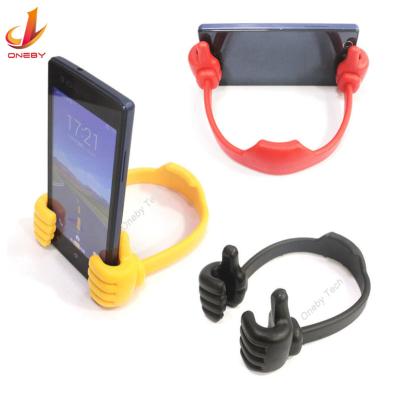 China Custom Universal Lazy Logo Thumb Phone Stand Mobile Phone Holder Silicone Tablet Adjustable Creative Mobile Phone Holder for sale