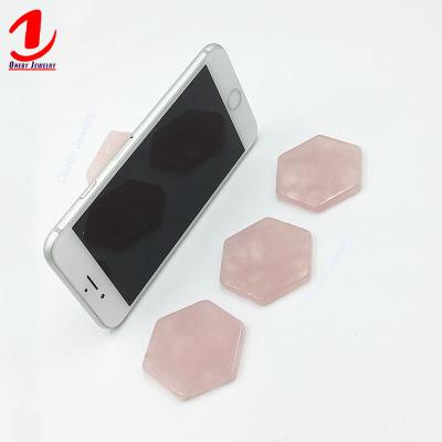 China Adjustable Hexagon Rose Quartz Adhesive Collapsible Retractable Fixed Promotional Hand Stick Holder Socket Mobile Phone Holder for sale