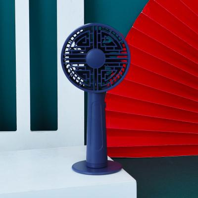 China Guochao Manual Handheld Wind Fan Radio Button Convenient Fan Mini USB Charging Small Fan for sale