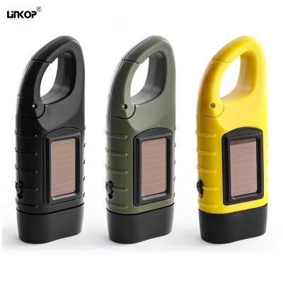 China Hand Cranked Solar LED Flashlight Rechargeable Emergency Mountaineering Buckle for sale