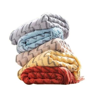 China Soft Wave Pattern Tassel Throw Blanket Super Soft Knit Blanket Amazon Hot Sale Wholesale Low Price Acrylic Blanket for sale