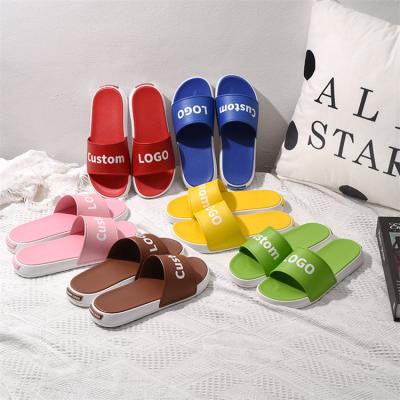 China Fashion Trend PVC Indoor Outdoor White Logo Slippers Slides Footwear Sandals Custom Made for Women and Ladies Unisex Slipper for sale