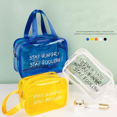 China Custom PVC transparent white yellow blue cosmetic bag zipper travel fashion logo clear beauty make up bags for sale