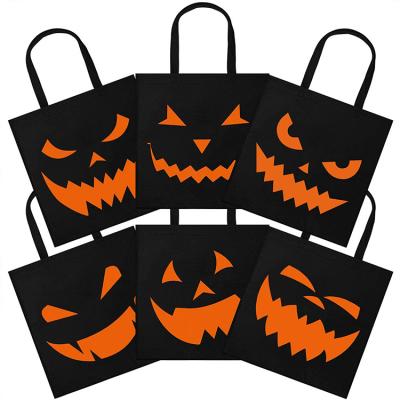 China 100% Eco-friendly Wholesale Cheap Cartoon Party Gift Packaging Bag Halloween Ultrasonic Black Nonwoven Bags Festival Eco-Friendly for sale