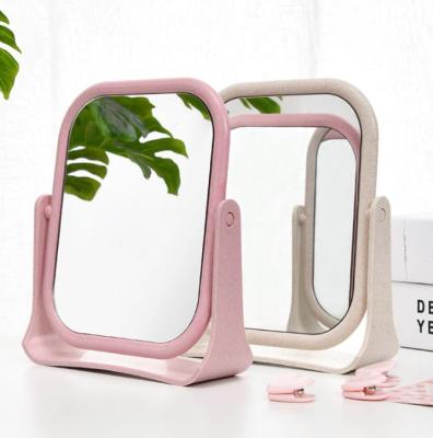 China Custom Double Sided Rotating Desktop Simple Folding Portable Makeup Mirror Makeup Mirror Dressing Table Mirror for sale